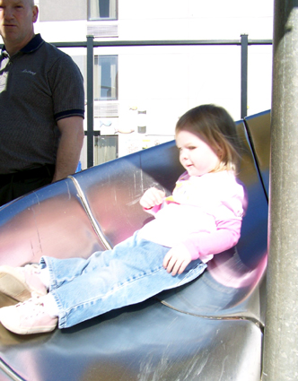 Anna going down a slide