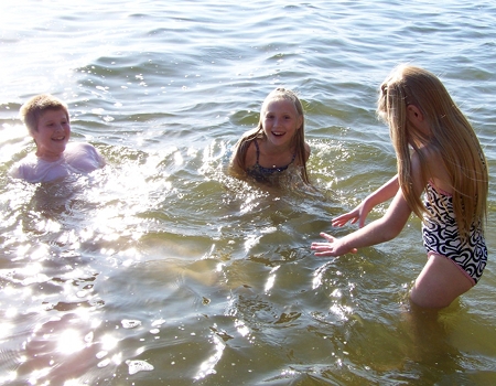 Nora, Corbin, and Rosa in the lake