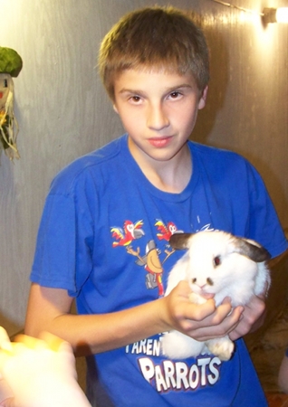 Caleb with a rabbit