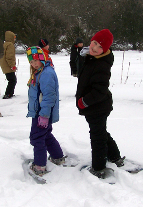 Corbin and Nora snowshoeing