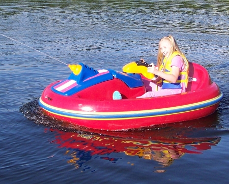 Nora in a fun boat