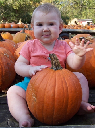 Ella with pumpkins