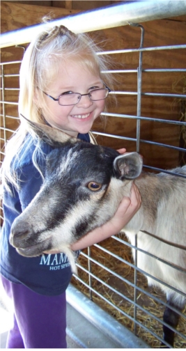 Anna with a goat