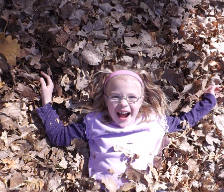 Anna in the leaves