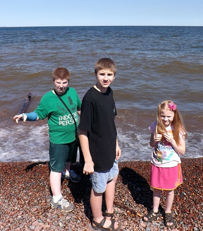 Corbin, Caleb, and Rosa at the beach
