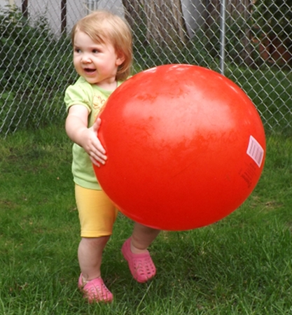 Ella holding a gigantic ball