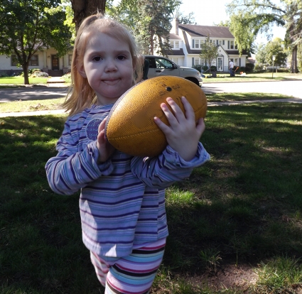 Ella with a football