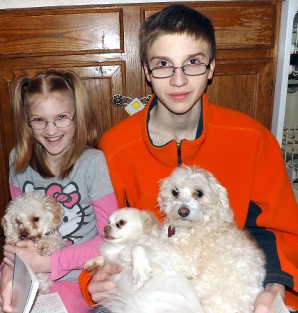 the 3 dogs with Rosa and Caleb