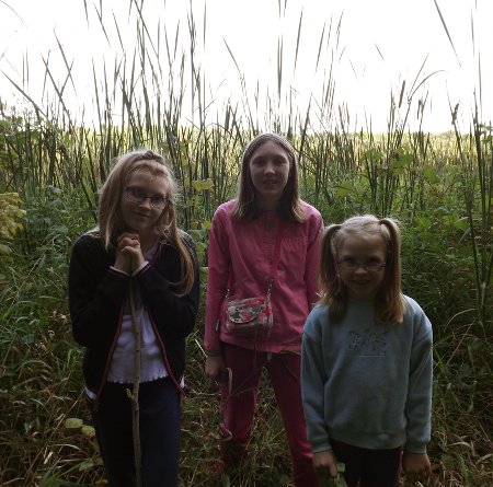the girls with the cattails