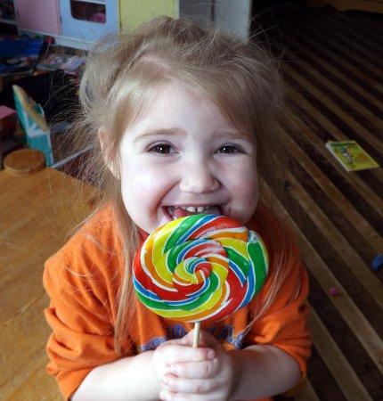 Ella with her lollipop