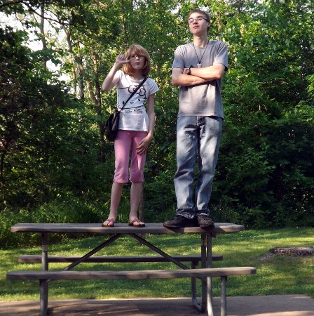 Caleb and Rosa standing on a table