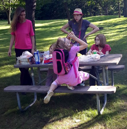the girls at the picnic table