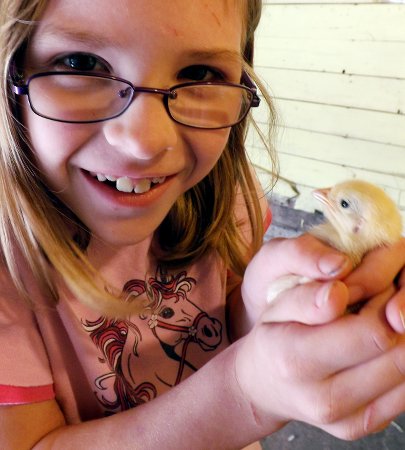 Anna holding a chick