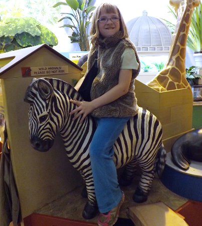 Anna on a zebra statue