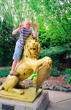 Alex on a lion statue