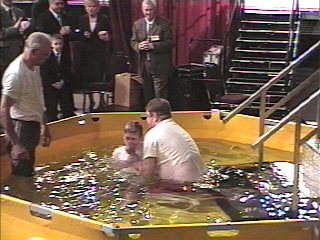 Alex being baptized