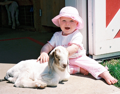 Anna with a goat kid