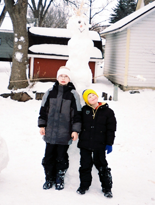 the boys with a big snowman