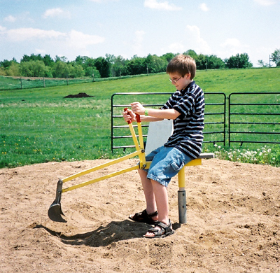 Caleb on a sand digger