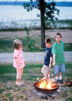 The kids roasting marshmallows