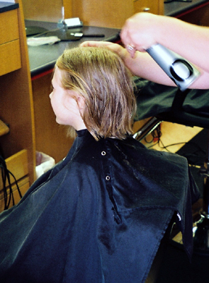Nora getting her hair cut