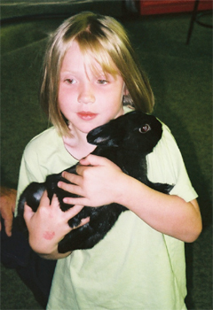 Nora holding a rabbit