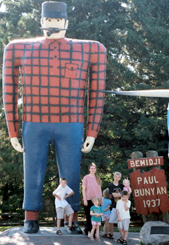 The gang with a giant Paul Bunyan.