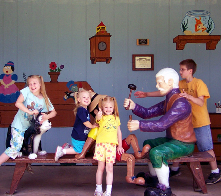 the girls and Caleb with Pinocchio characters
